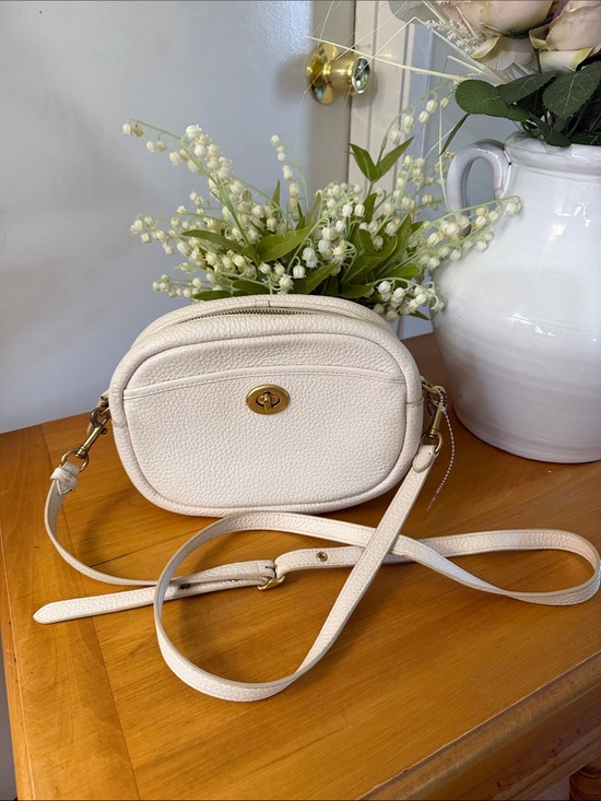 Coach Handbags - Coach Camera C5809 Cream Pebbled Leather Crossbody Bag with Turn-Lock Closure